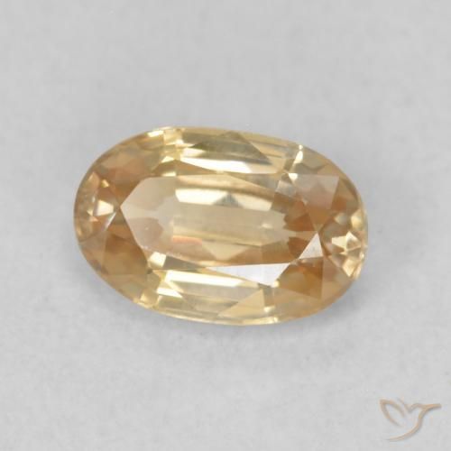 Circón Dorado durazno claro natural de 0.70 ct, Ovalada, VVS-VS
