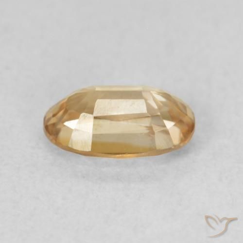 Circón Dorado durazno claro natural de 0.70 ct, Ovalada, VVS-VS