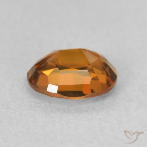 Circón Medium Dark-Orange natural de 0.93 ct, Ovalada, VVS-VS