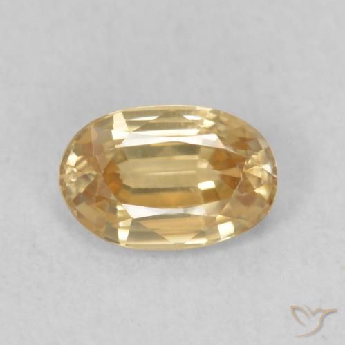 0.68ct Natural Dorado durazno claro Circón, Ovalada, VVS-VS