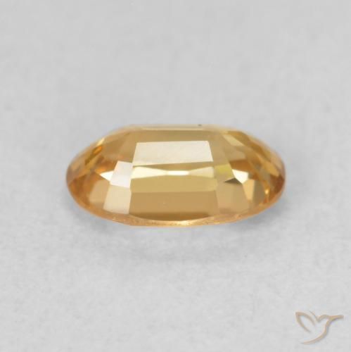 Circón Dorado durazno claro natural de 0.68 ct, Ovalada, VVS-VS