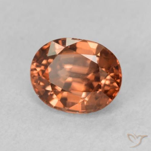 Circón Naranja oscuro natural de 0.94 ct, Ovalada, VVS-VS