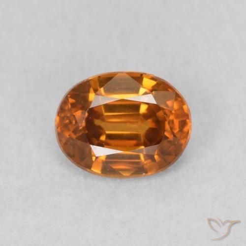 0.60ct Natural Naranja oscuro Circón, Ovalada, VVS-VS
