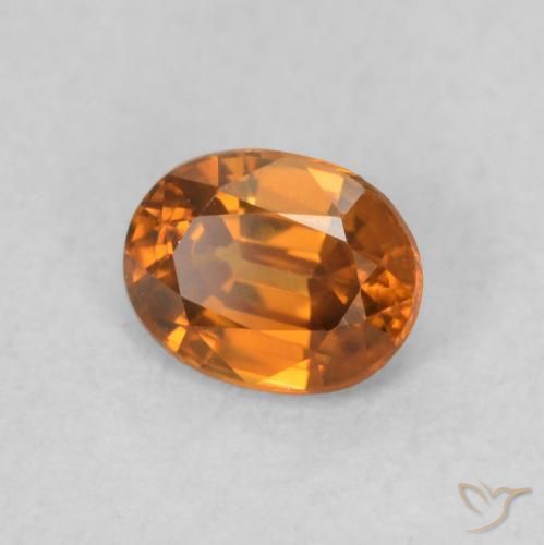 Circón Naranja oscuro natural de 0.60 ct, Ovalada, VVS-VS