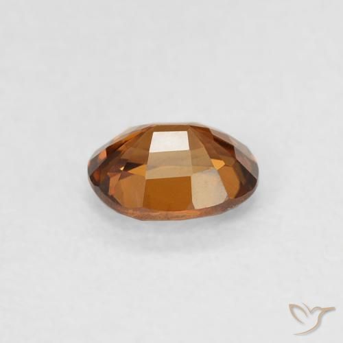 Circón Ámbar naranja natural de 0.62 ct, Ovalada, VVS