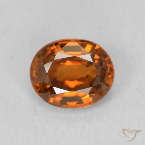 1.03ct Natural Naranja oscuro Circón, Ovalada, VVS-VS