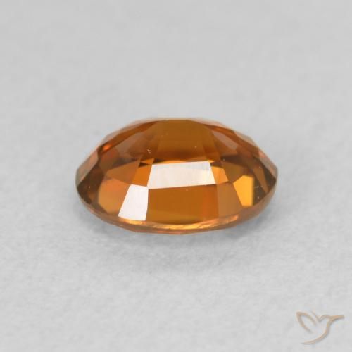 Circón Naranja oscuro natural de 1.03 ct, Ovalada, VVS-VS