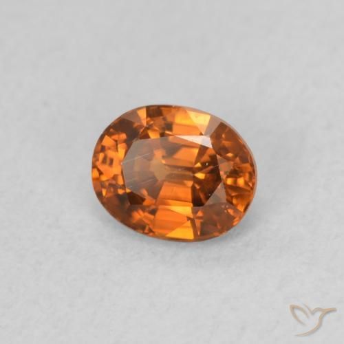 Circón Naranja oscuro natural de 0.60 ct, Ovalada, VS