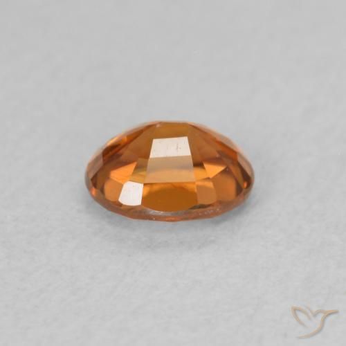 Circón Naranja oscuro natural de 0.60 ct, Ovalada, VS