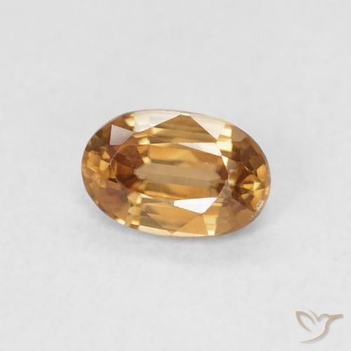 Circón Naranja marrón natural de 0.74 ct, Ovalada, VVS-VS