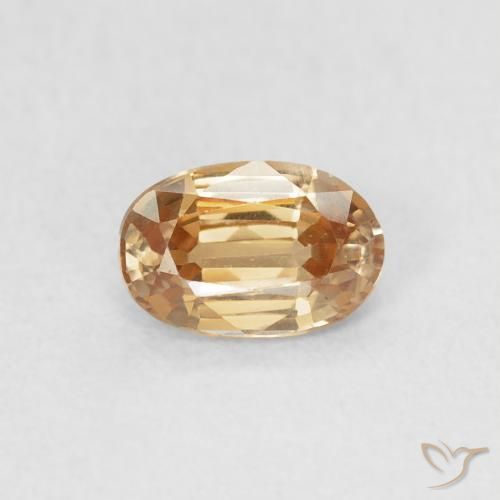 0.70ct Natural Dorado durazno claro Circón, Ovalada, VVS-VS