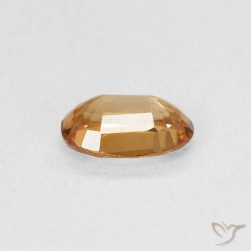 Circón Dorado durazno claro natural de 0.70 ct, Ovalada, VVS-VS
