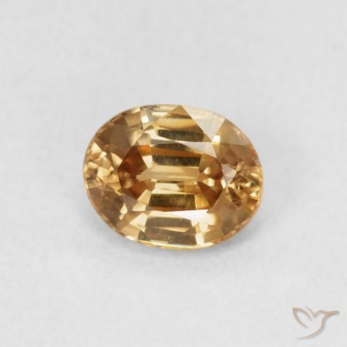 Circón Dorado medio natural de 0.98 ct, Ovalada, VS