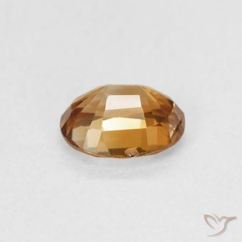 Circón Dorado medio natural de 0.98 ct, Ovalada, VS