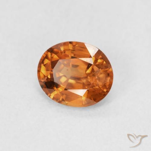 Circón Naranja oscuro natural de 0.91 ct, Ovalada, VS