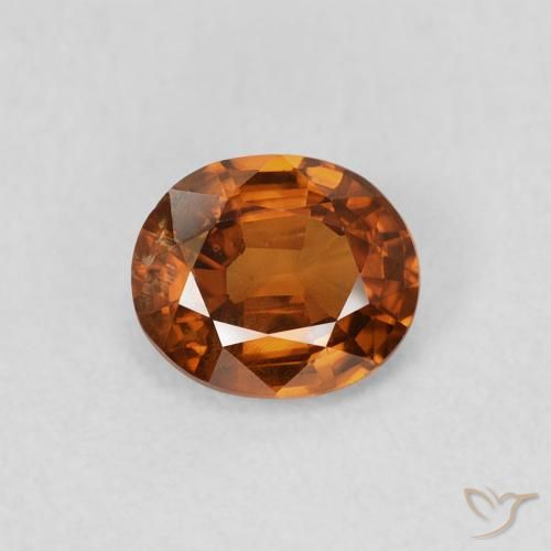 0.86ct Natural Naranja oscuro Circón, Ovalada, VS