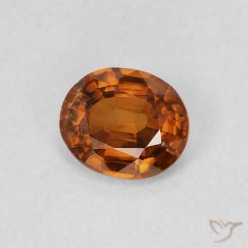 Circón Naranja oscuro natural de 0.86 ct, Ovalada, VS