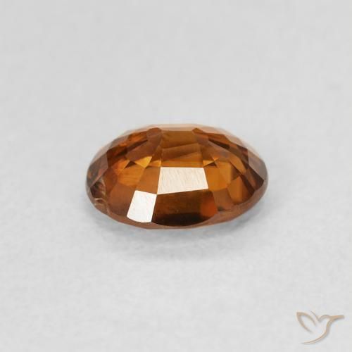 Circón Naranja oscuro natural de 0.86 ct, Ovalada, VS