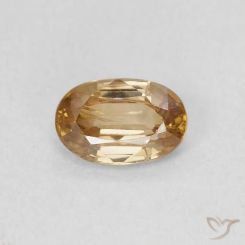 0.69ct Natural Oro Circón, Ovalada, VS