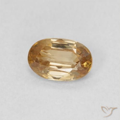 Circón Oro natural de 0.69 ct, Ovalada, VS
