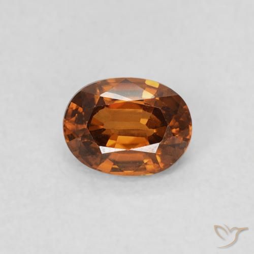 0.60ct Natural Medium Dark-Orange Circón, Ovalada, VS