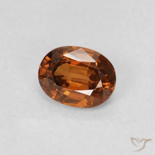 Circón Medium Dark-Orange natural de 0.60 ct, Ovalada, VS
