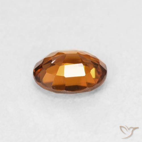 Circón Naranja oscuro natural de 0.83 ct, Ovalada, VVS