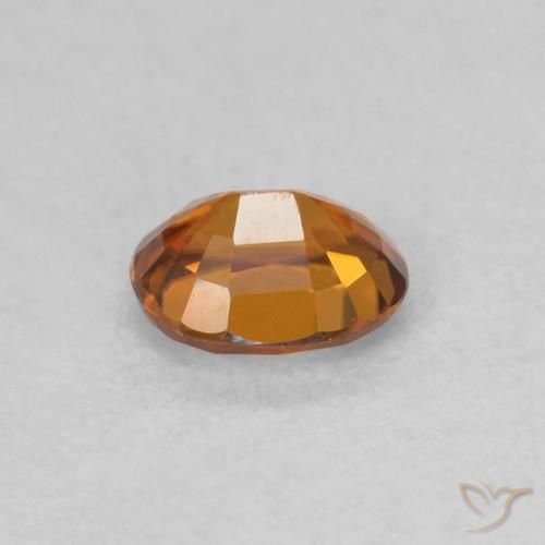 Circón Medium Dark-Orange natural de 0.62 ct, Ovalada, VVS