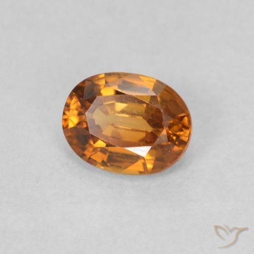 Circón Marrón naranja natural de 0.61 ct, Ovalada, VVS
