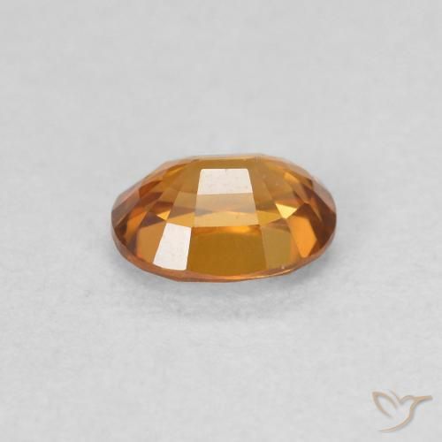 Circón Marrón naranja natural de 0.61 ct, Ovalada, VVS