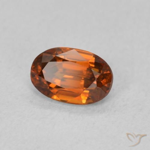 Circón Naranja oscuro natural de 0.84 ct, Ovalada, VVS