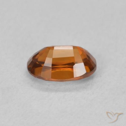 Circón Naranja oscuro natural de 0.84 ct, Ovalada, VVS