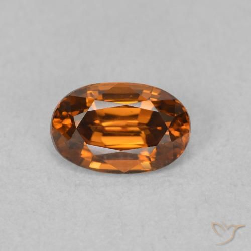 0.78ct Natural Medium Dark-Orange Circón, Ovalada, VVS