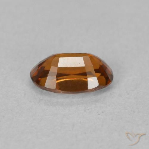 Circón Medium Dark-Orange natural de 0.78 ct, Ovalada, VVS