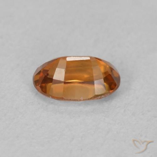Circón Medium Dark-Orange natural de 0.81 ct, Ovalada, VVS