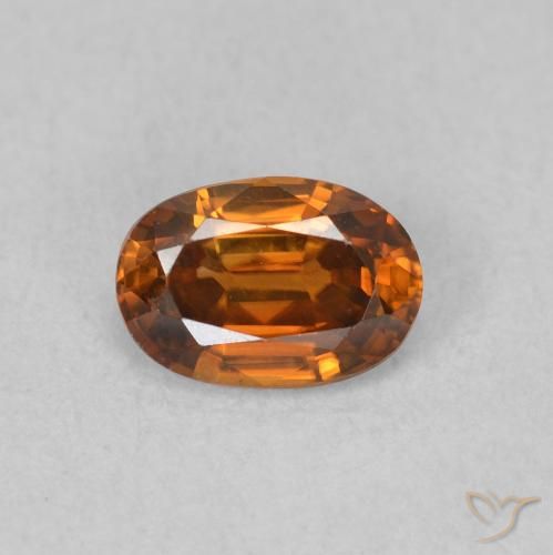 0.73ct Natural Medium Dark-Orange Circón, Ovalada, VVS