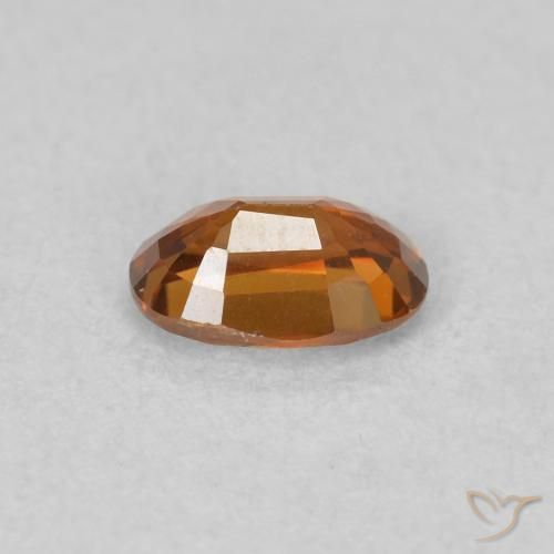 Circón Medium Dark-Orange natural de 0.73 ct, Ovalada, VVS