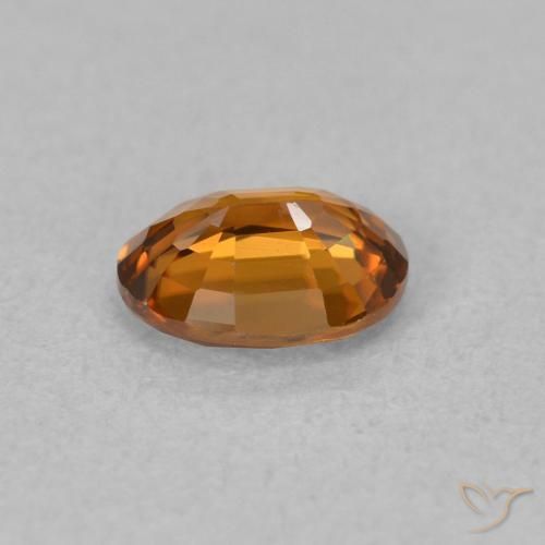 Circón Naranja medio natural de 0.86 ct, Ovalada, VVS