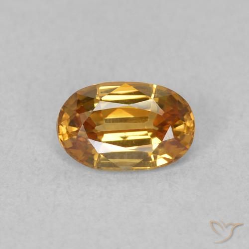 0.70ct Natural Naranja oscuro Circón, Ovalada, VVS