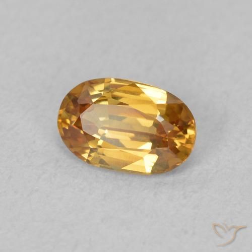 Circón Naranja oscuro natural de 0.70 ct, Ovalada, VVS