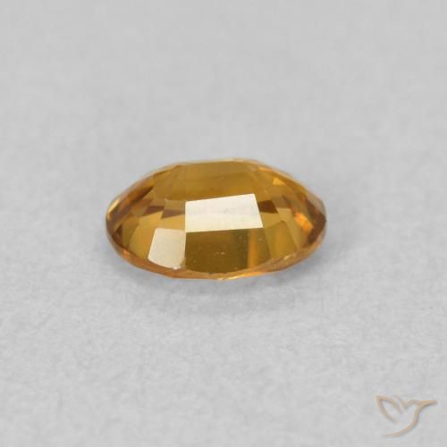 Circón Dorado medio natural de 0.55 ct, Ovalada, VVS