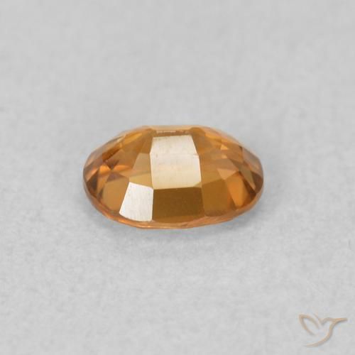 Circón Marrón naranja natural de 0.61 ct, Ovalada, VVS