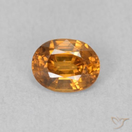0.60ct Natural Naranja óxido Circón, Ovalada, VVS