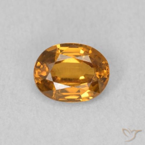 0.62ct Natural Naranja medio Circón, Ovalada, VVS