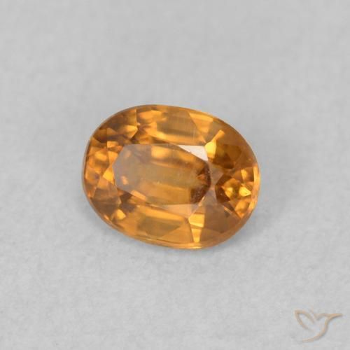 Circón Marrón naranja natural de 0.64 ct, Ovalada, VVS