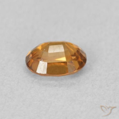 Circón Marrón naranja natural de 0.64 ct, Ovalada, VVS