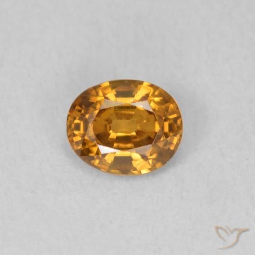 0.59ct Natural Naranja medio Circón, Ovalada, VVS