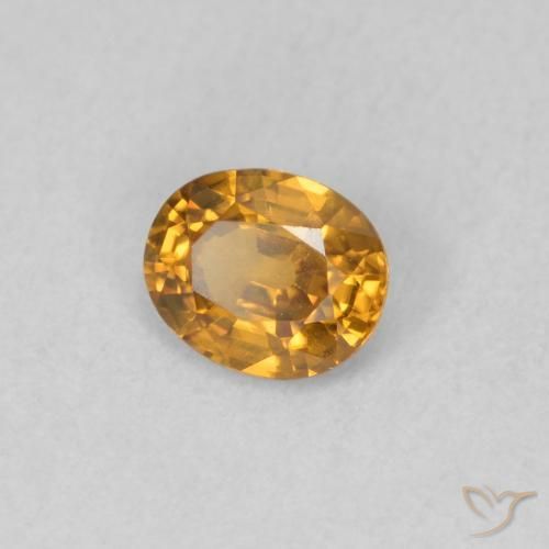 Circón Naranja medio natural de 0.59 ct, Ovalada, VVS