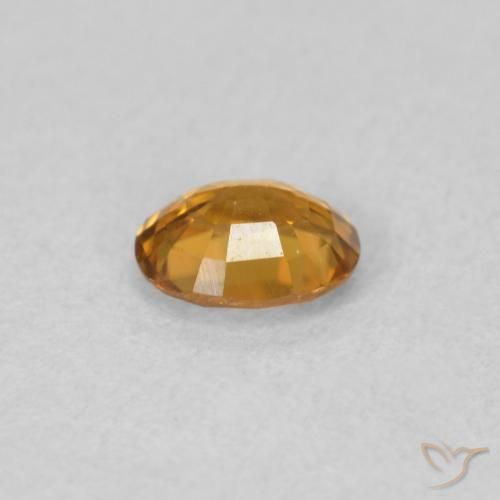 Circón Naranja medio natural de 0.59 ct, Ovalada, VVS