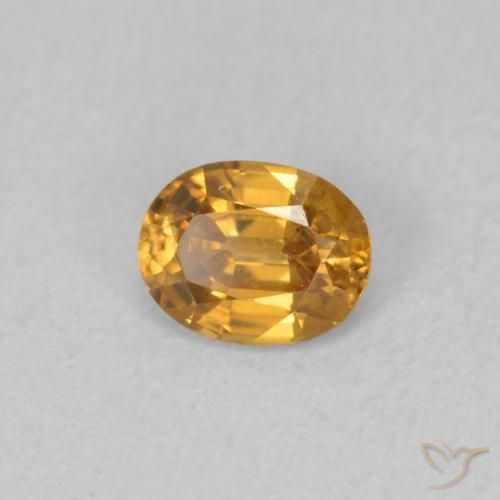 Circón Naranja medio natural de 0.61 ct, Ovalada, VVS